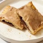 Homemade brown sugar cinnamon pop tarts with flaky pastry, cinnamon glaze, and brown sugar filling