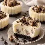 No-Bake Cookie Dough Mini Cheesecakes with chocolate cookie crust and whipped cream