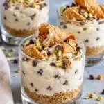 No-Bake Cannoli Cheesecake Cups with Ricotta 11 Cannoli cheesecake cups with golden cookie crumbs, ricotta filling, mini chocolate chips and crisp shell pieces